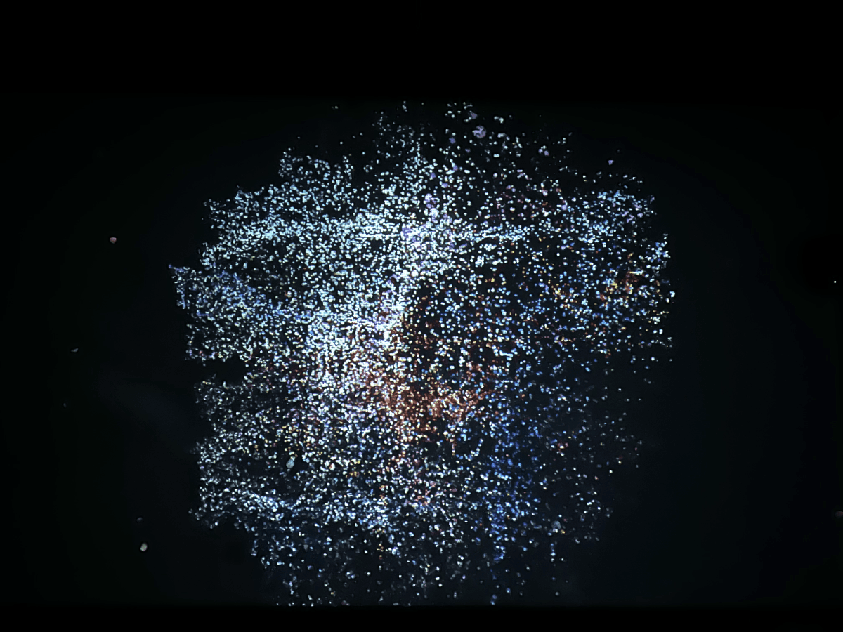 A picture containing fireworks, space, darkness, universe Description automatically generated